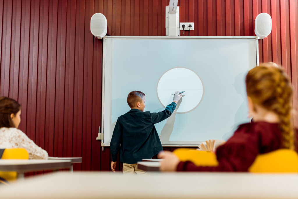 Interactive whiteboard in classroom and board room